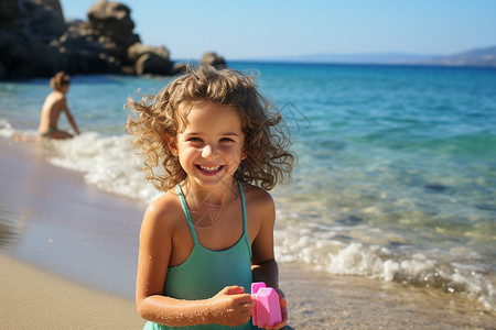 沙滩玩耍的女孩海滩上玩耍的小女孩背景