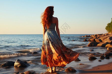 海边漂亮的长发女孩背景图片
