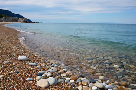 海边的岩石和沙子背景图片