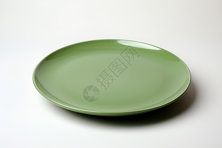 清新绿色的陶瓷餐盘背景图片