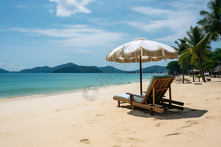 海滩上的椅子和遮阳伞背景图片