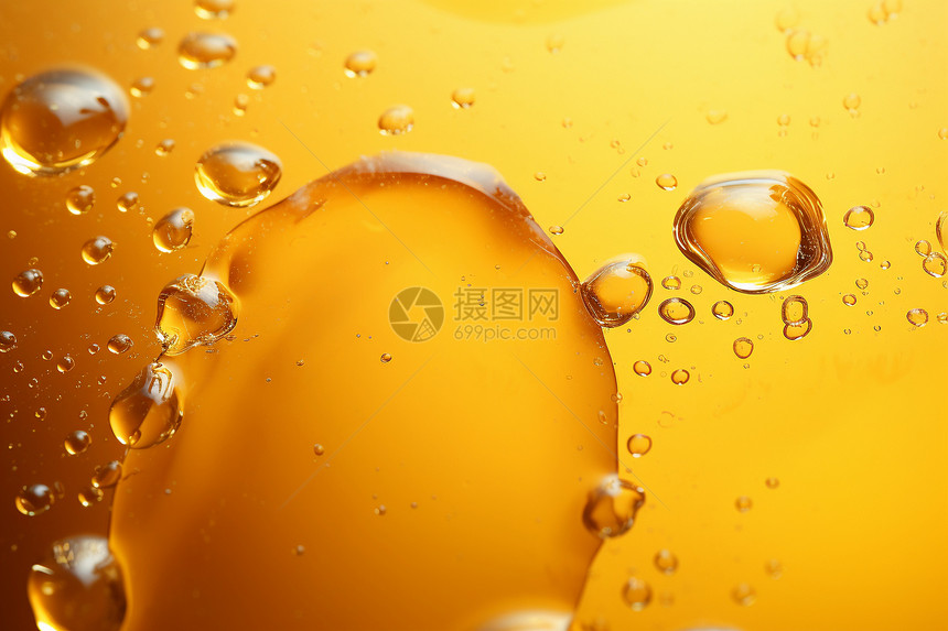 金黄的液体气泡背景图片