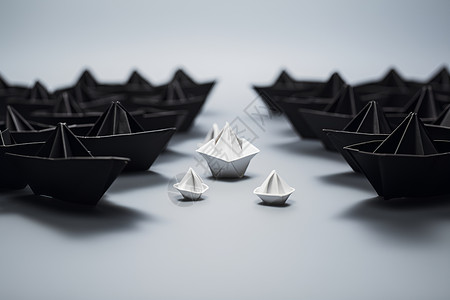 黑色纸船中的白色折纸背景图片