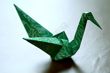 传统手工拉坯翠绿折纸鸟设计图片