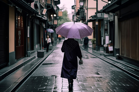街道拿着雨伞的女士高清图片