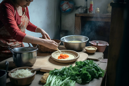 女性在厨房里做饭背景图片