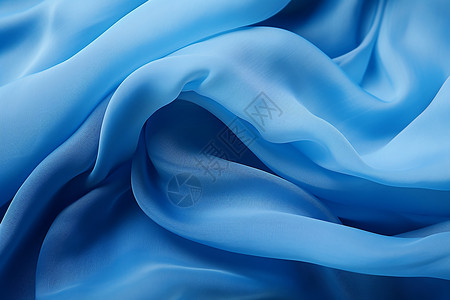 天蓝色的丝绸布料背景图片