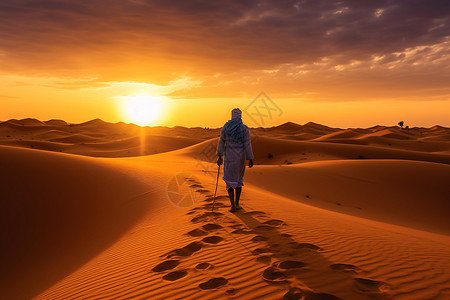 沙漠中行走的人背景图片