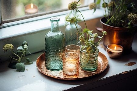 窗台上的花瓶和蜡烛托盘背景图片