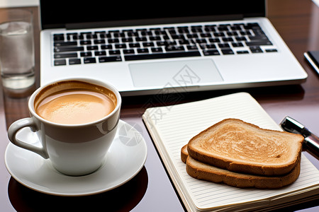 早晨工作室的咖啡和面包背景图片