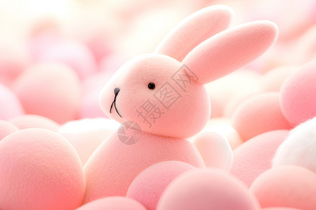 粉色的兔子玩具背景图片