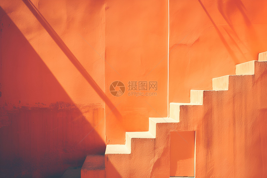 橙色墙壁楼梯图片