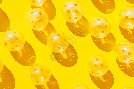 排列的黄色球背景图片