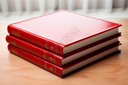 红纸张素材桌子上的红书堆背景