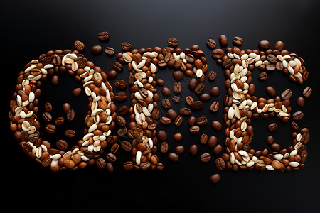 咖啡豆摆出来的字母背景图片