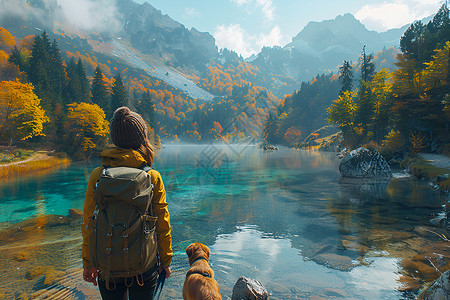 带着小狗旅游欣赏着湖边景色的女人背景