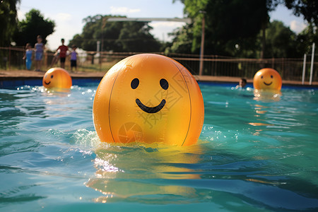 游泳池里的笑脸气球背景图片