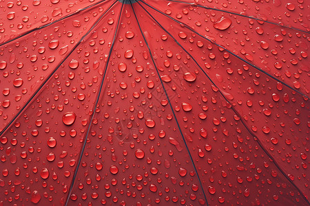 雨滴落在红伞上高清图片