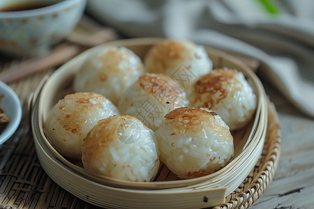 美味的饭团食物蒸屉高清图片