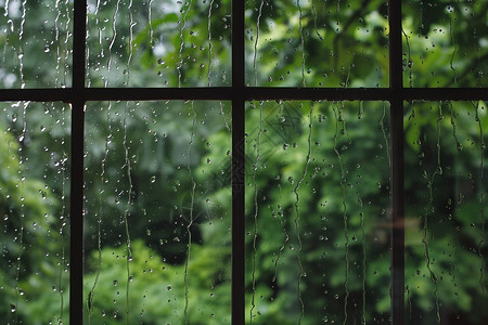 窗户绿色窗上的雨滴背景