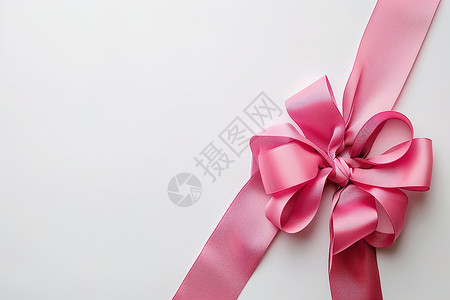 淡粉色彩带漂亮的蝴蝶结背景