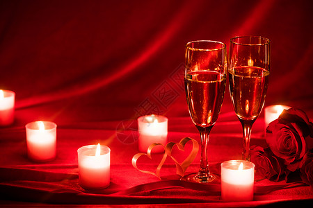 情人节背景与香槟杯,玫瑰,蜡烛心香槟杯玫瑰图片
