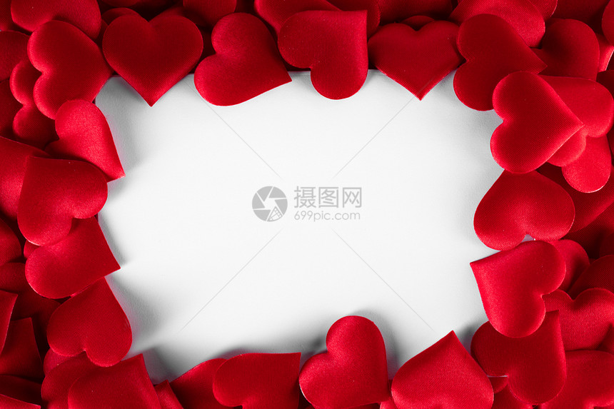 情人节的许多红色丝绸心背景,边框隔离白色与,爱的情人节的心框架图片