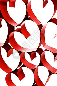 红色丝带形状为白色背景的心红丝带的心图片