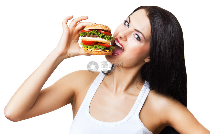 女人白色背景下咬汉堡包图片