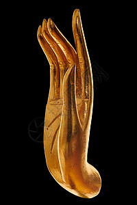 佛陀之手黑色背景上佛像金色手的特写背景