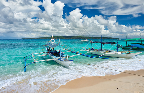 美丽的海滩与船巴厘岛,菲律宾图片