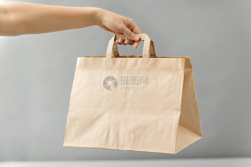回收,购物生态手次棕色外卖食品纸袋与午餐桌子上手外卖食品纸袋午餐图片