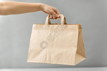 回收,购物生态手次棕色外卖食品纸袋与午餐桌子上手外卖食品纸袋午餐图片