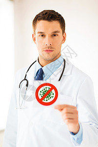 健康,医学大流行男医生持有冠状病标志男医生持有冠状病征图片