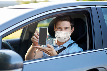 健康保护,安全大流行男子或汽车司机戴口罩,智能手机男汽车司机,智能手机戴面罩背景