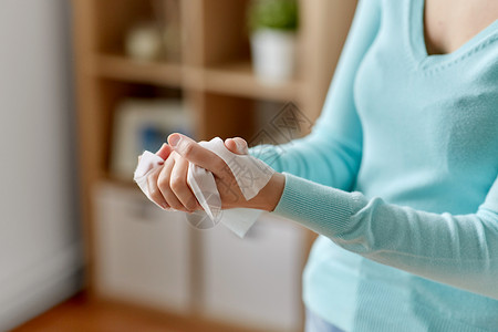 消菌剂卫生保健消用防腐剂湿擦拭妇女清洁双手妇女用消湿擦擦手背景