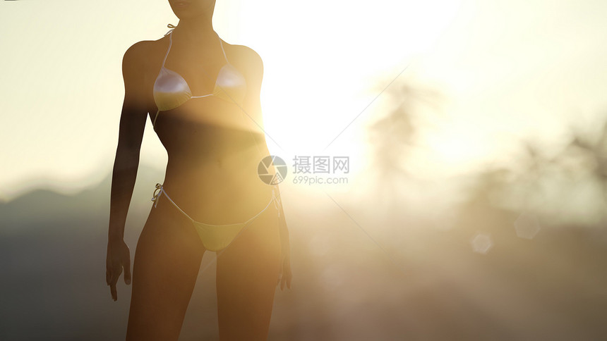 日落时,穿着泳衣的年轻女人棕榈树附近日落时穿着泳衣的年轻女人图片