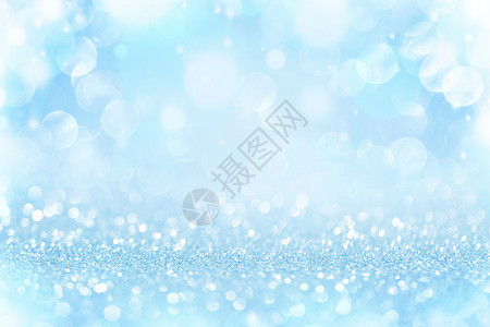 圣诞节新年假期蓝色背景模糊的闪光波克模糊的Bokeh背景图片