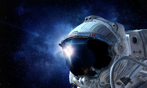 太空任务中的宇航员,背景上有星空宇航员先驱做研究背景图片