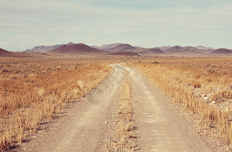 草原的道路荒芜的自然旅行背景高清图片
