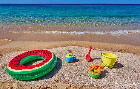 西托尼亚希腊西索尼亚美丽的海滩,充气戒指玩具背景