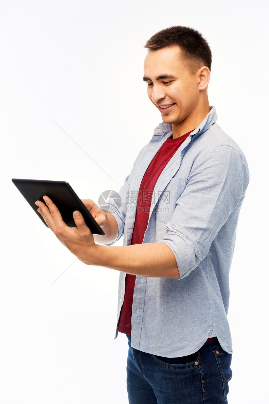 技术人的快乐的轻人平板电脑白色背景快乐的轻人平板电脑图片