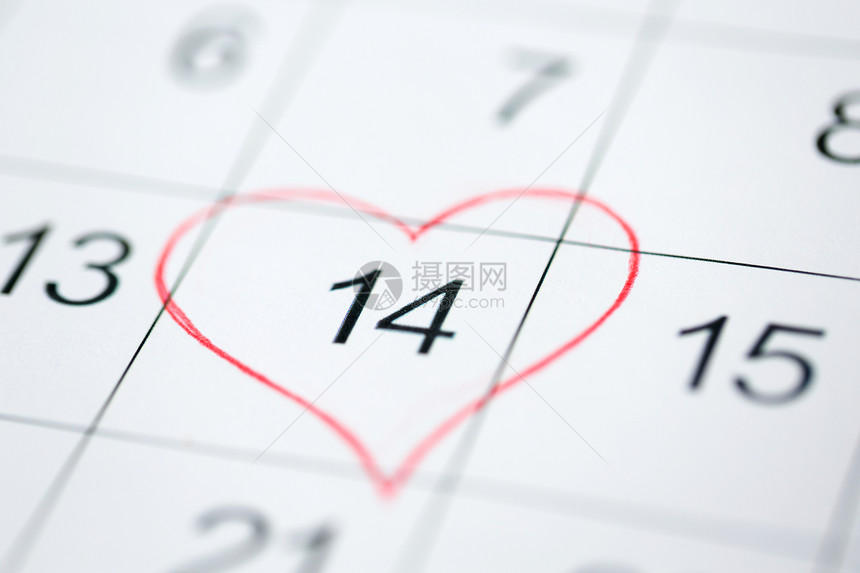 情人节假日日历表与2月14日的日期,以红色心形标记日历上2月14日的日期图片