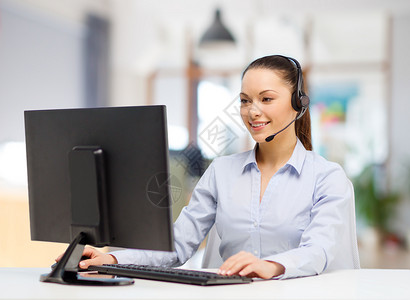 商业,技术通信女帮助热线运营商耳机工作办公室办公室工作的耳机中的帮助热线接线员背景图片