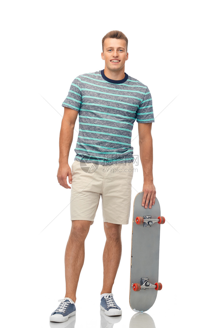运动,休闲滑板微笑的轻人与滑板白色背景微笑的轻人,滑板超过白色图片