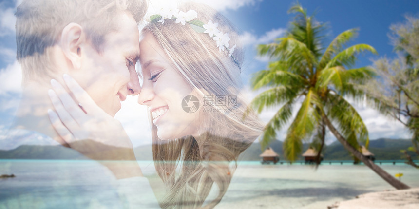 暑假,爱旅行的快乐的微笑轻嬉皮夫妇褪色热带海滩背景法属波利尼西亚,双曝光效果嬉皮士夫妇异国情调的海滩背景下褪色图片
