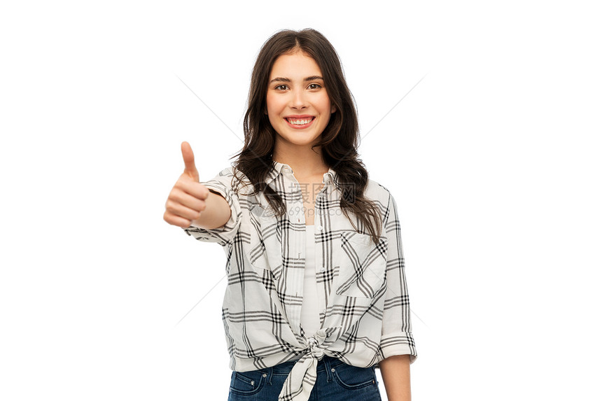 手势人的快乐微笑的轻女人十几岁的女孩穿着格子衬衫,白色的背景上竖大拇指轻的女人十几岁的女孩竖大拇指图片