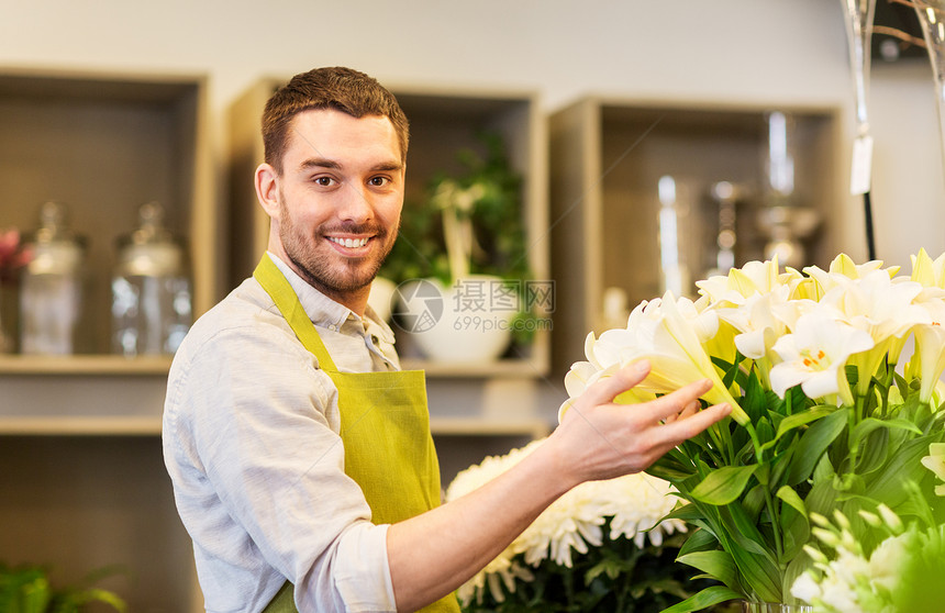 小生意,销售花卉花店销售商与白色百合花花店里白色百合的花店销售商图片