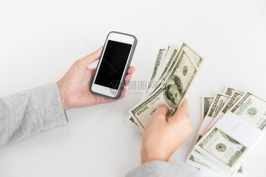 商业,移动支付技术密切与智能手机美元的手用智能手机美元的钱把手收来图片