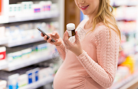 怀孕,医学保健密切孕妇与智能手机选择药物药房孕妇药房选药图片